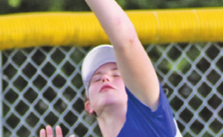 PAYTON SODOLAK catches a fly ball for an out during a Snook-Latexo bi-district playoff game. -- Tribune photo by Roy Sanders
