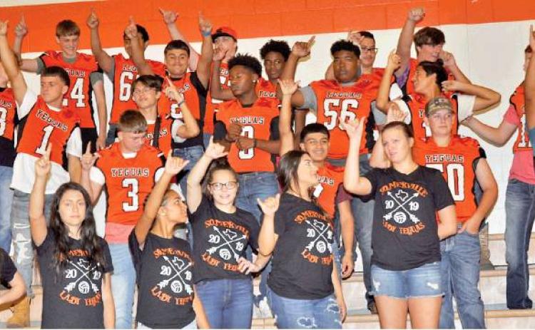 THE SOMERVILLE YEGUAS volleyball and football teams enjoy “Meet the Yeguas” on Thursday, Aug. 22, at Yegua Gym. All the athletes and coaches were recognized and cheered by enthusiastic Yegua fans. -- Tribune photo by Roy Sanders