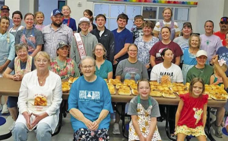 SNOOK SPJST YOUTH CLUB MEMBERS baked almost 82 dozen kolaches, sausage rolls, cinnamon rolls and dinner rolls at the annual kolache baking school in Snook. The baked goods were sold in the annual Country Store held in conjunction with the Snook Volunteer Fire Department’s barbecue fundraiser.