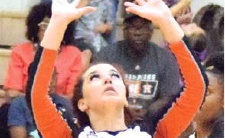 SOMERVILLE’S MADDIE Knox sets the ball during the Snook-Somerville match last Tuesday. -- Tribune photo by Denise Hornaday