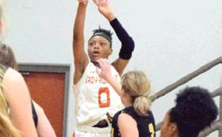 JA’ASIA MATHIS shoots to score two of her six points during Caldwell’s game against North Zulch last Tuesday night in Caldwell.