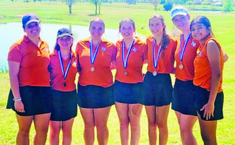 THE CALDWELL GIRLS team, taking third in Navasota, includes, from left, Kierstyn Macik, Brandy Gillar, Tanzley Johnson, Raeleigh Ussery, Madilyn Schneider, Alison Krueger and Patsy Pineda.