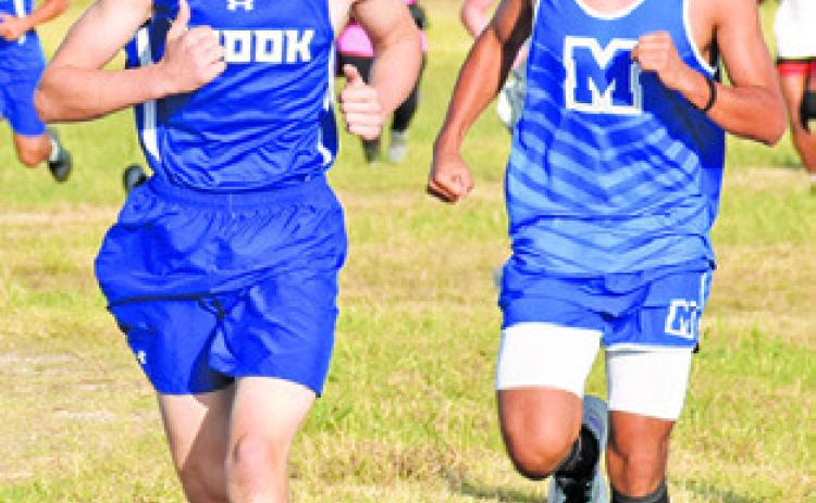 ETHAN JANAC WON THE boys’ varsity title at last week’s District 26-2A Cross Country Meet at the Snook City Park.