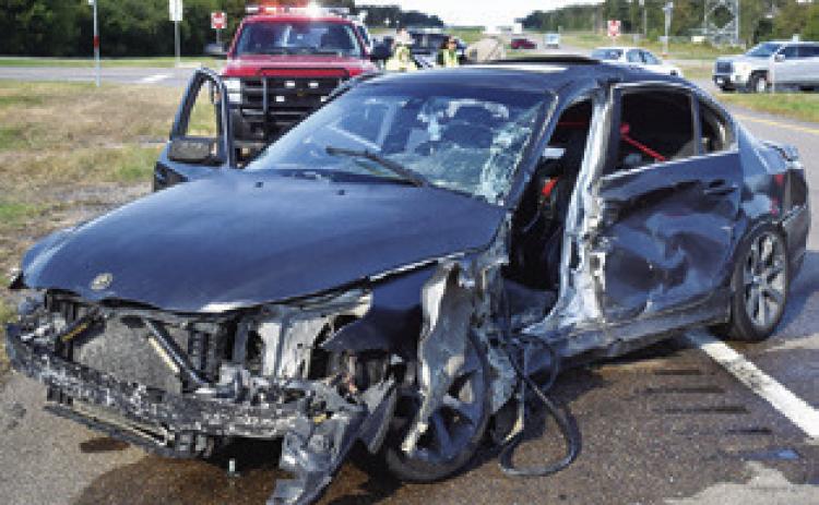 THIS BMW DRIVEN by Aiken Taylor Morgan was damaged on Thursday, Oct. 8, in a collision at F.M. 60 at F.M. 3058. Tribune photo by Roy Sanders