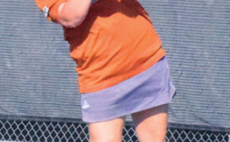 NEVA CRAVENS and her girls doubles partner Aletza Torres won their District 20-4A match against a Smithville duo with a perfect 6-0, 6-0. -- Tribune photo by Denise Hornaday