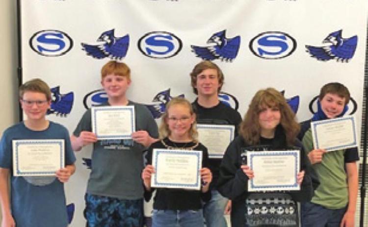 SNOOK SECONDARY students who participated and placed at academic UIL events were recognized at the April Snook ISD School Board meeting. Those who were able to attend were pictured: front row from left, Luke Watkins, Kaylie Holden, and Kelsey Andrus; and back row from left, Alexander Bond, Caleb See, Jensen Weaver.