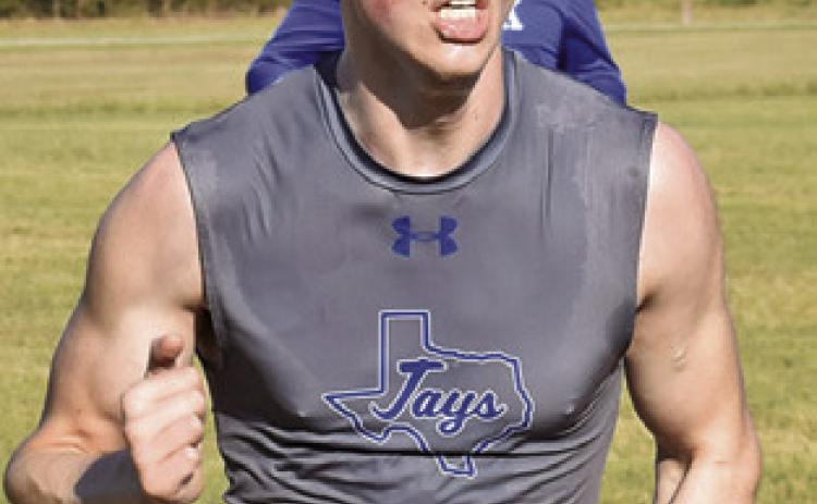 SNOOK’S ETHAN Janac won the boys varsity race at the District 26-2A Cross Country Meet last week in Caldwell. Tribune photo by Roy Sanders