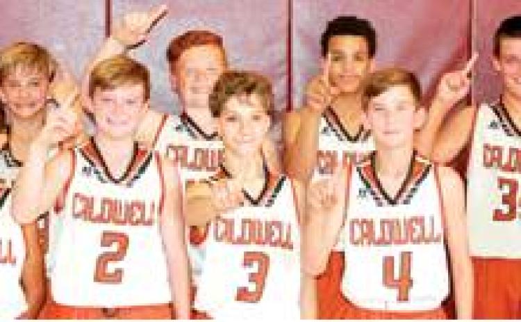 THE CALDWELL MIDDLE School 7A basketball team won the Thorn-dale Tournament last week with wins over Thorndale and Rockdale. Team members are pictured after winning the tournament.