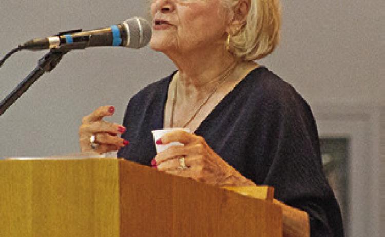 LUCY KATZ, HIDDEN CHILD Holocaust survivor, speaks at the Caldwell Civic Center on Sunday, Sept. 27. Tribune photo by Sabine Lazo