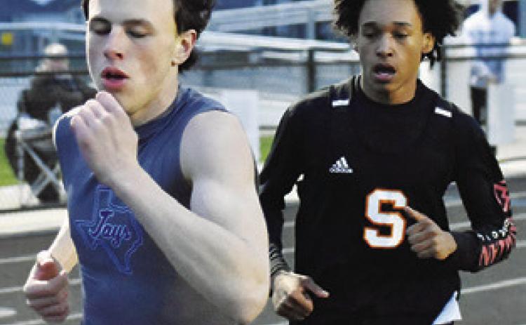 SNOOK’S ETHAN Janac and Somerville’s Jeremy Vela run in the 800-meter run. Vela wins the race with a time of 2:17.31. Janac finishes third with a time of 2:18.65.
