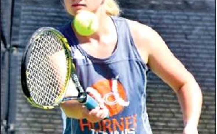 PAIGE ODENBACH and her doubles partner Neva Cravens won their girls doubles match against a duo from Smithville on Saturday.