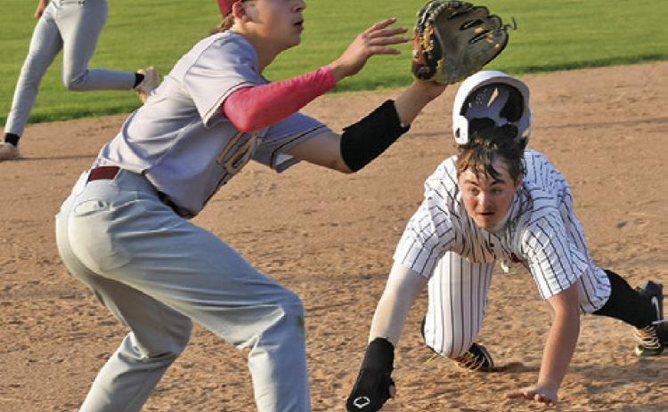 SOMERVILLE’S LUKE MOSES gets ready to slide into third base last Friday in the Yeguas’ season finale against Milano. Tribune photo by Roy Sanders