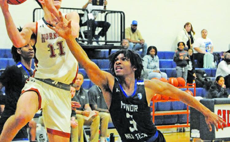 Hornets hold on for 66-65 win at Taylor
