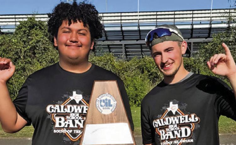 THE CALDWELL HIGH SCHOOL Hornet Band earned a Division I Superior Rating at the UIL Region 18/26 Marching Contest in Giddings on Saturday. The band will compete at the Area D Marching Contest this Saturday at Hays High School in Buda. Pictured are drum majors Aaron Orona Valle and Grant Leubner.