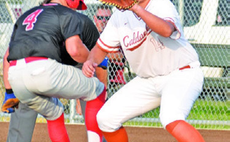 CALDWELL FIRST baseman Preston Supak prepares to make this catch and tag this Salado player. -- Tribune photo by Roy Sanders