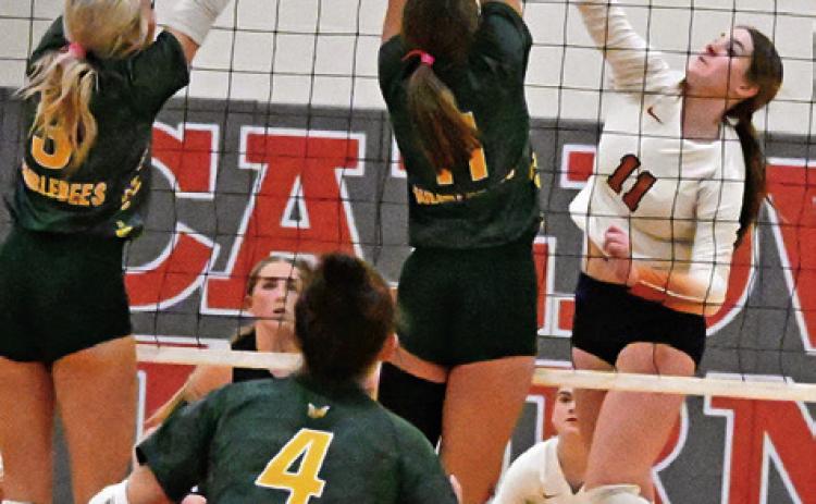 CALDWELL’S LYDIA GIESE earns one of her 15 kills on Friday afternoon against Little River Academy in Hornet Gym. Tribune photo by Denise Squier