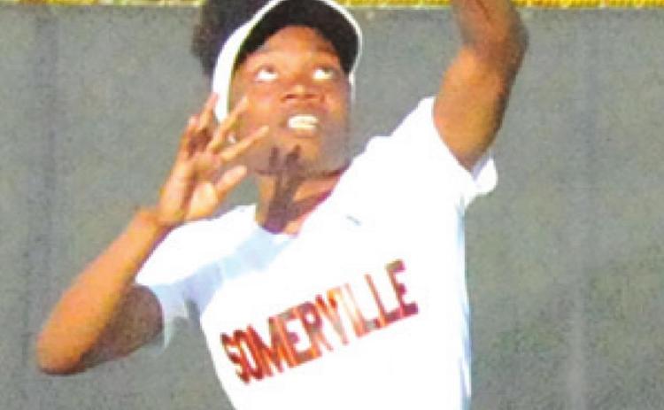 CAMIA MARTIN SETS to catch a fly ball for an out during the Somerville-Iola game last Friday. -- Tribune photo by Denise Squier