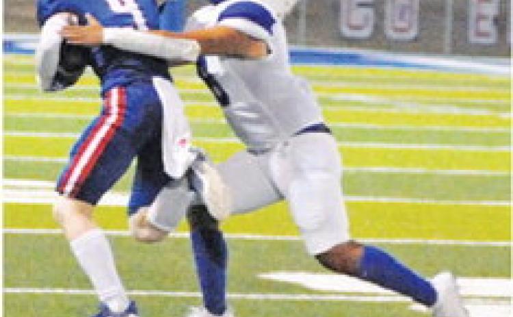 SNOOK’S JACOB Castaneda moves in for a tackle against Brazos Christian.