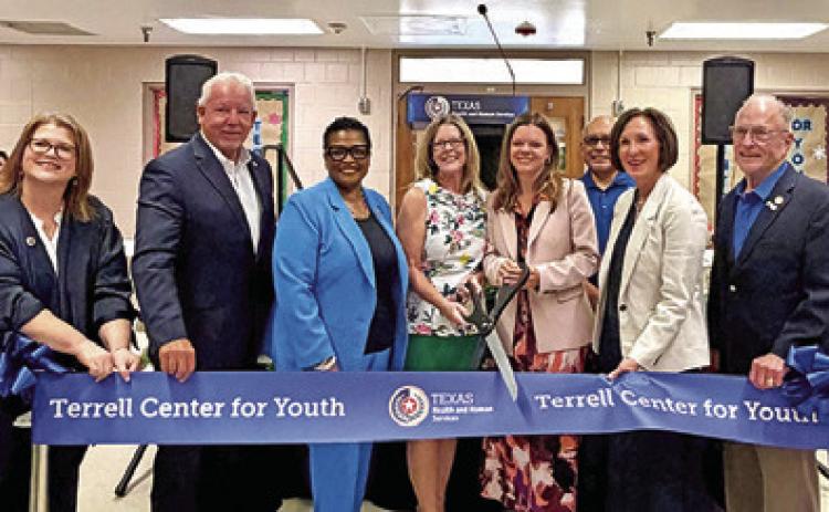 SEN. LOIS KOLKHORST, second from the right, attends the ribbon cutting ceremony for the newly created Terrell Youth Center.