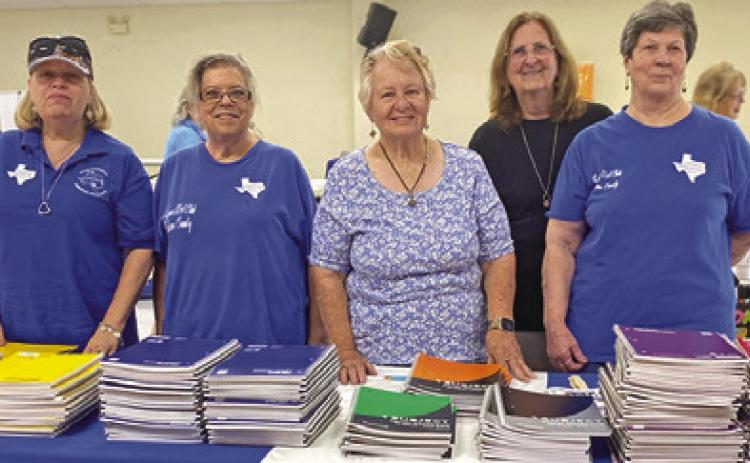 LYONS EDUCATION EXTENSION Association Club donated spiral notebooks to the “Back to School Blast.” Pictured, from left, are, Terri Sissoms, Tammy Qualls-Tucker, Sharon Stevenson, Debbie Schumacher and Brenda Kolojaco. Photo courtesy of the Lyons EEA