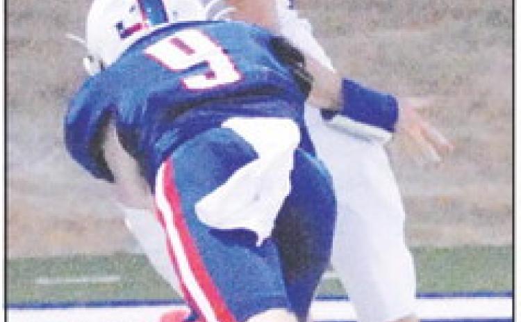 JOSH GREEN OF Snook makes a catch against Brazos Christian. Tribune photo by Denise Squier