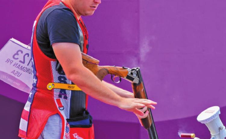CALDWELL’S PHILLIP JUNGMAN reloads his shotgun during the Men’s Skeet shooting event at the 2020 Tokyo Olympics at the Asaka Shooting Range. Jungman finished 15th in the qualifying rounds for Team U.S.A. -- Photo courtesy of U.S. Army Marksmanship Unit