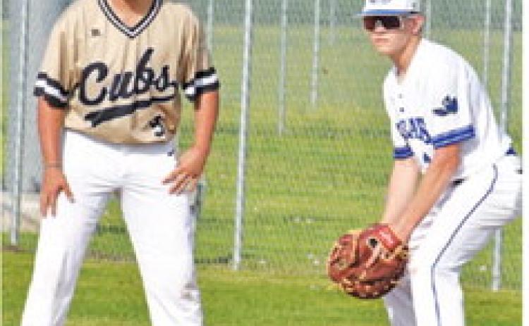SNOOK’S KADE JUNEK watches carefully from first base.