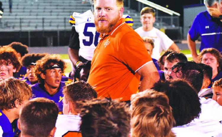 BOONE PATTERSON ADDRESSES Caldwell and La Grange players after the La Grange game. -- Tribune photo by Roy Sanders