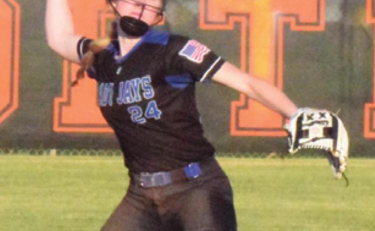 JAYCIE BRISCO sets to throw out a Somerville runner at home plate during Snook’s 9-1 loss to the Lady Yeguas on Friday.