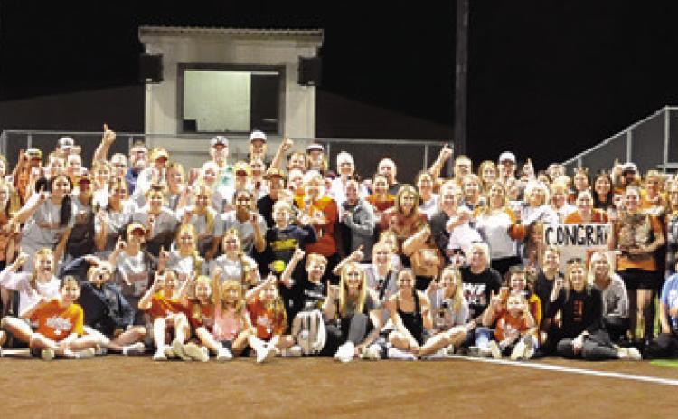 CURRENT AND FORMER LADY HORNETS, Caldwell ISD staff and Caldwell residents honored Wendy Weiss at Friday night’s home game -- her final home game coaching the Lady Hornets before she retires after 29 years. -- Tribune photo by Denise Squier