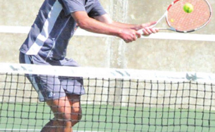 CALDWELL’S CONNER Hughson placed first in the Boys’ Singles B Bracket at last week’s Rudder Ranger Varsity Roundup.