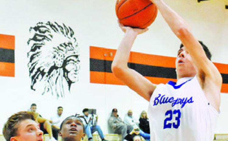 JOSH GREEN of Snook takes a shot against Aggieland Homeschool JV at the Koppers Tournament in Somerville.