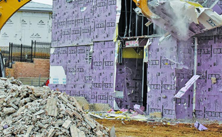 DEMOLITION GETS underway last week at the city hall construction site in Caldwell.