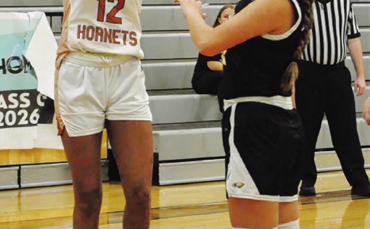 CALDWELL’S TYNIAH JOHNSON shoots the ball over a Bruceville-Eddy player during the Lady Hornets’ game against the Lady Eagles last Monday at Hornet Gym. -- Tribune photo by Denise Squier