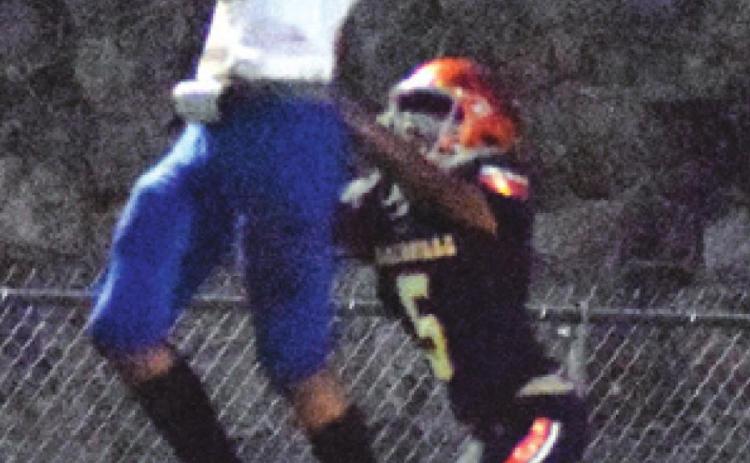 ANDERSON-SHIRO’S Ca’Darrius Williams leaps for the catch while Somerville’s Verkobe Woodberry tries to make a defensive play Friday. -- Tribune photo by Denise Hornaday