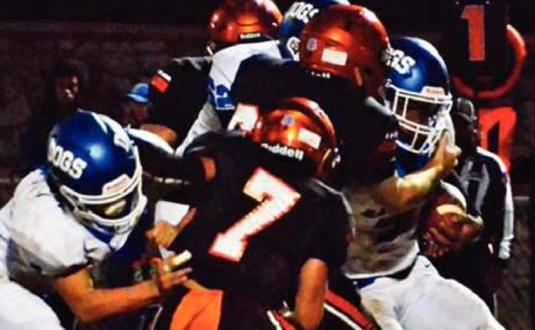 THE SOMERVILLE DEFENSE, including Jesus Gomez, surround this Bartlett ball carrier. -- Tribune photo by Roy Sanders