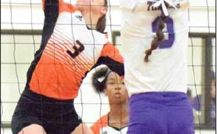 EMMA KOVASOVIC reaches for the kill during Somerville’s bi-district match against Thrall. -- Tribune photo by Denise Hornaday