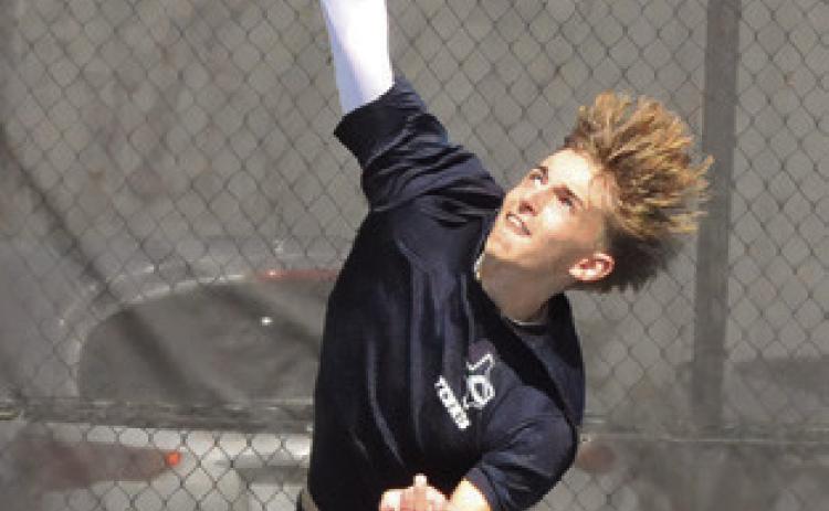 CALDWELL’S DYLAN Chapman is pictured serving at the Caldwell Classic Varsity Tennis Tournament in 2025. Chapman competed at the UIL Class 4A State Tennis Tournament, earning a spot on The Tribune’s Top 10 Sports of 2025 list. Tribune photo by Denise Squier