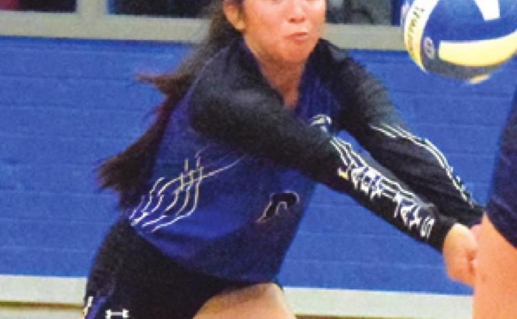 SNOOK SENIOR PAOLA Arredondo dives to bump the ball during the Lady Jays match against Madisonville last Tuesday night in Snook. -- Tribune photo by Denise Squier