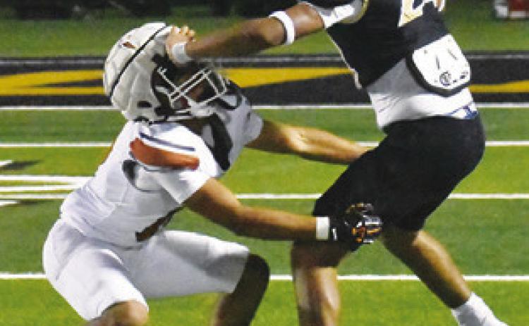 ROGELIO HERNANDEZ moves in for a tackle against McGregor in the Hornets’ win. Tribune photo by Roy Sanders