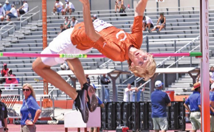 DANIEL COWAN JUMPS at the state track meet in Austin.