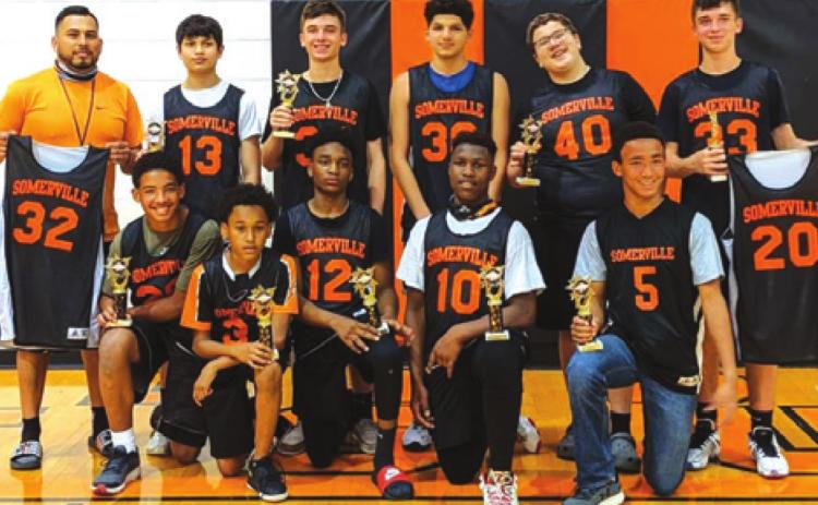 THE SOMERVILLE LITTLE Dribblers 14u team recently won the regional tournament and qualified for nationals. Pictured, from left, front, are DeChristian Deere, Jeremy Vela Jr., Kasen Edwards, JaKeith Daniels, Christopher Deere, back, Coach Joshua Vela, Stevan Martinez, Kason Rohrbach, Gavin Williams, Canyon Fields and Kutter Rohrbach. Not pictured are Ian Teague and Keith Crawford.
