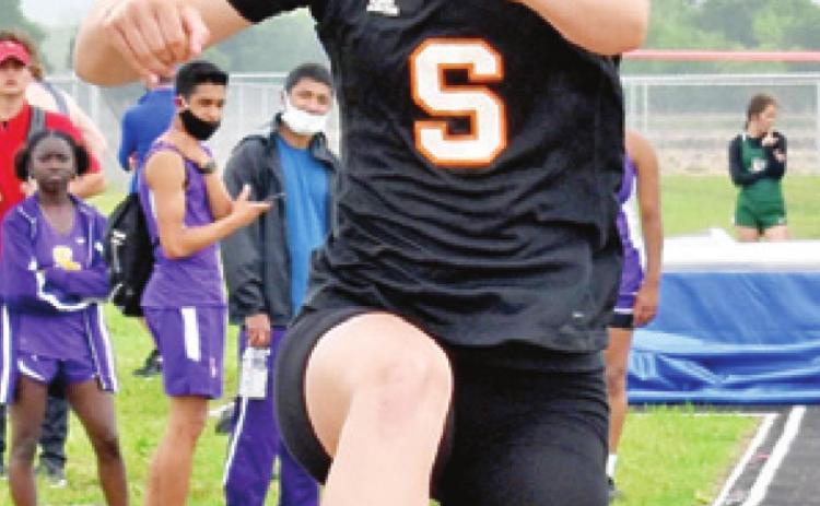 EMMA KOVASOVIC places third in the triple jump at the Class 2A Area District 25/26 Track and Field Meet last Wednesday in Snook.