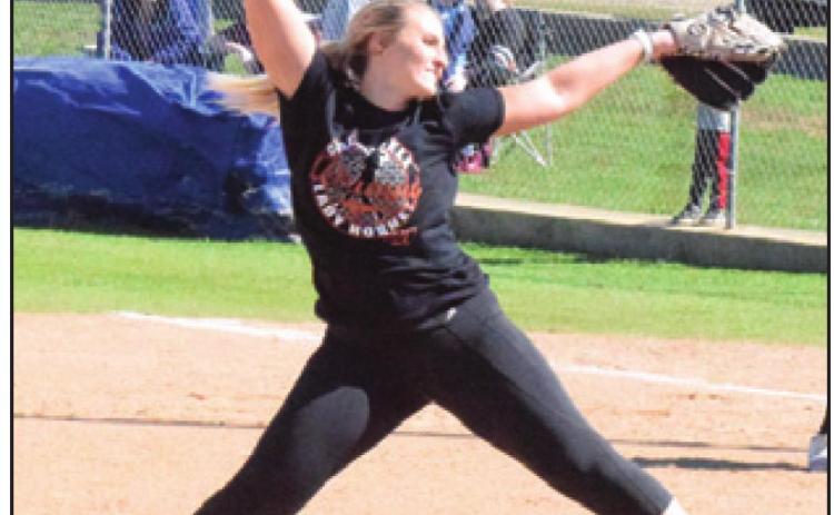 FORMER LADY HORNET pitcher Casey Kauder shows that she hasn’t lost her form during the annual Lady Hornet Alumni Scrimmage on Saturday, Feb. 1.
