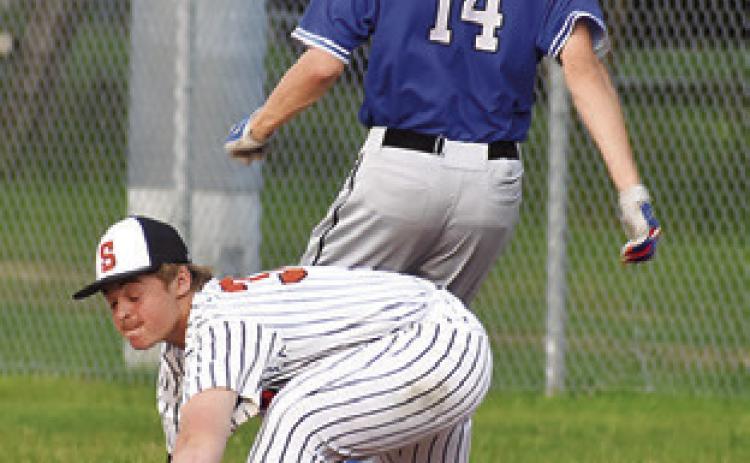 SOMERVILLE’S LUKE Moses reaches for the ball. -- Tribune photo by Roy Sanders