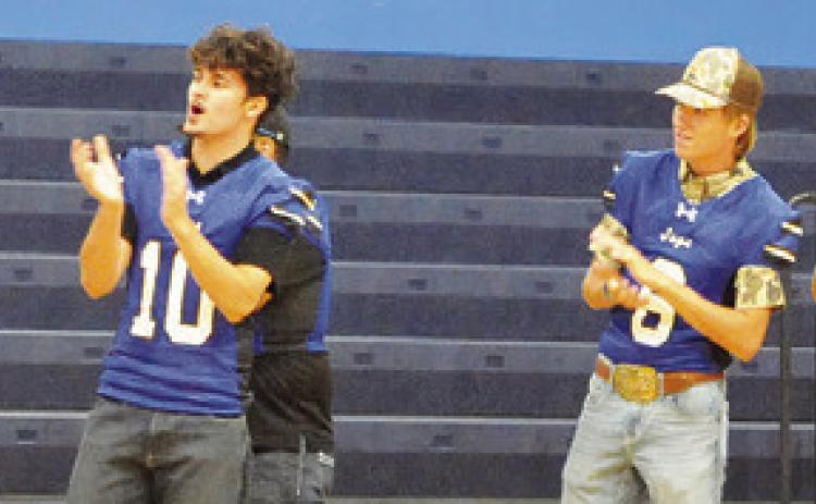 SNOOK BLUEJAY FOOTBALL players applaud for each other as each team member was announced during Monday’s “Meet the Bluejays.” Tribune photo by Denise Squier