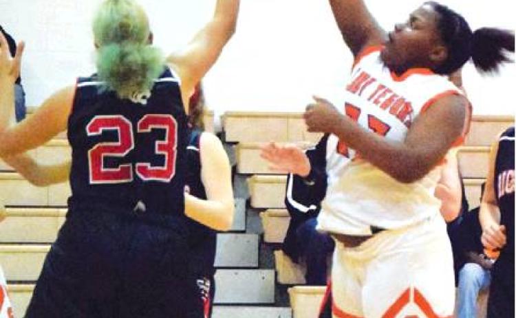 SOMERVILLE’S NICOLE RUSSELL puts up a shot during the Lady Yeguas 82-13 win over Richards Friday night at home. Russell scored five points in the win. -- Tribune photo by Denise Hornaday