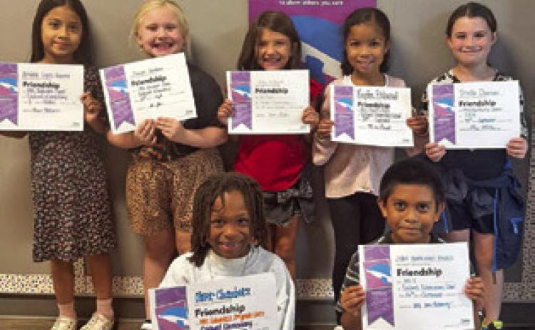 SEVEN SECOND-GRADE students at Caldwell Elementary School were recognized with Person of Value for Friendship certificates. Pictured, from left, back, are Amaris Lopez-Guerra, Sawyer Sandner, Emory McFarland, Kaydra Richmond, Stella Doonan, front, Oliver Chambers and Juan Barragan Valdez.