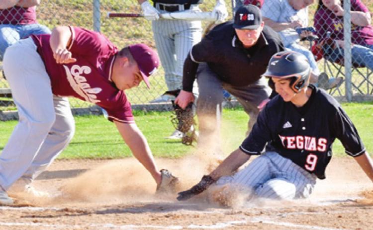 GARDNER SHIVERS SLIDES into home for this run for Somerville.