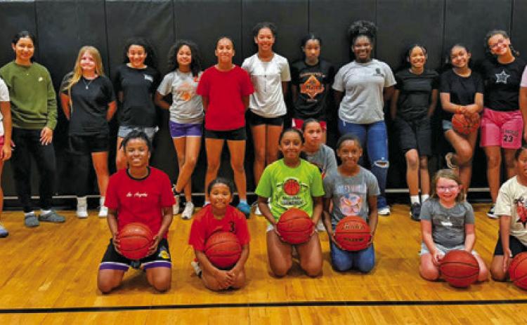 SEVERAL CURRENT AND FUTURE Lady Yeguas had fun at last week’s basketball portion of the Lady Yegua Sports Camp.